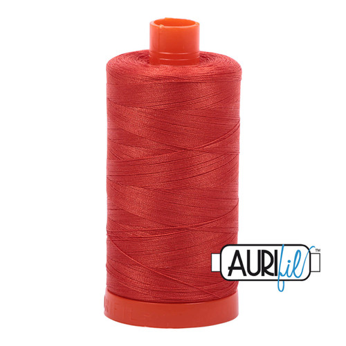 Large spool of Aurifil Red Orange 50wt Egyptian cotton thread with Aurifil Logo