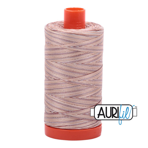 Large spool of Aurifil Biscotti 50wt Egyptian cotton thread, beige variegated with Aurifil logo