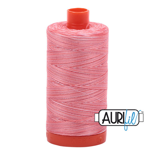 Large spool of Aurifil Flamingo 50wt Egyptian cotton thread, pink variegated with Aurifil Logo