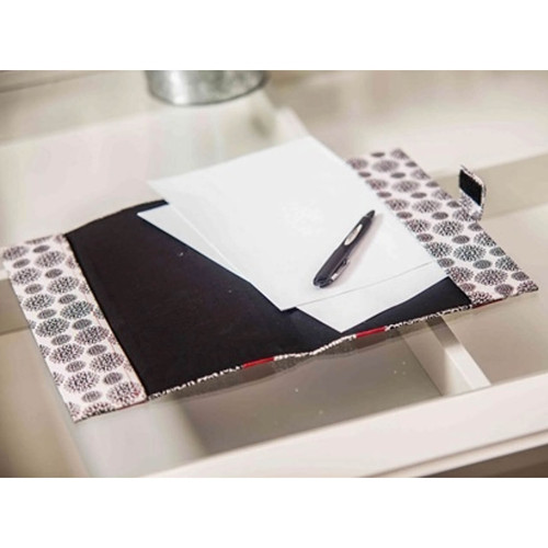 Fabric-covered portfolio using Vlieseline Decovil I Light fusible interfacing, showing structured support for craft and bag making projects.