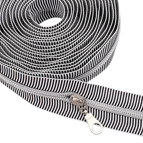 Close-up of silver coil on Black Stripe tape with teardrop pull attached