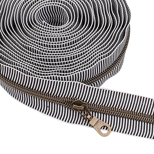 Close-up of bronze coil on Black Stripe tape with teardrop pull attached