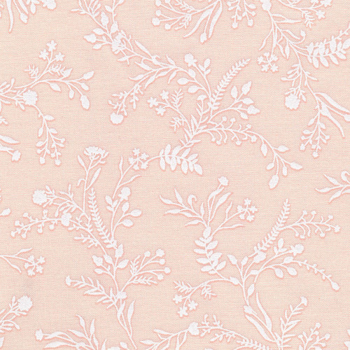 Robert Kaufman Alabaster Hues Stretch in Ice Peach fabric with white trailing botanical motifs on a warm ice peach background