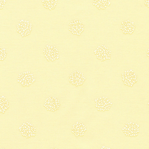 Robert Kaufman Alabaster Hues Hop in Sunshine fabric with pale sunshine yellow background and small white dotted floral motifs