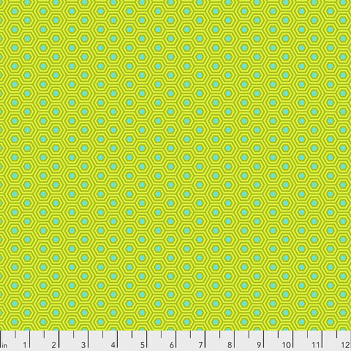 Free Spirit True Colors Hexy Chameleon fabric featuring lime green hexagonal geometric motifs with aqua and olive detailing.