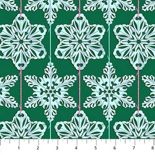 Northcott Cozy Christmas Collection Paperflakes Mint quilting fabric with ruler to show scale