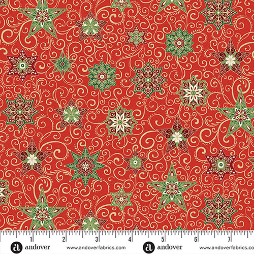 Makower UK Adorn Collection Star in Red metallic quilting fabric shown with ruler for scale, featuring red background, decorative stars, swirling vines and metallic accents.