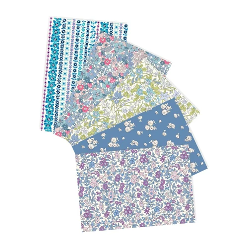 Forget-Me-Not Liberty fat quarter bundle with five coordinating blue, lilac, pink and green floral Lasenby Cotton fabrics curated by Morris Works