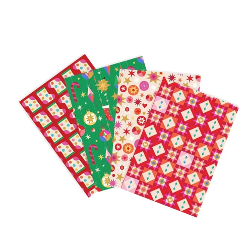 Festive Fancies Home for Christmas four-piece fat quarter bundle with cakes, Christmas decorations, stars and colourful geometric prints