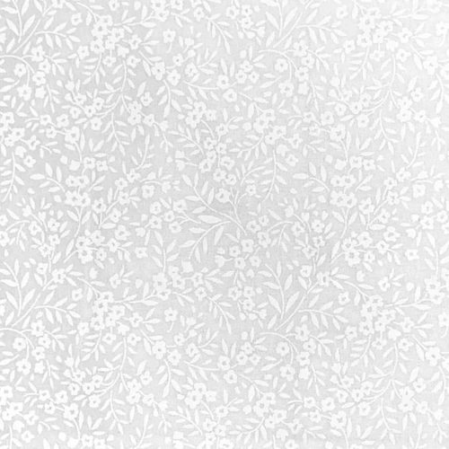 Close-up of Fabric Freedom Vine & Flowers white on white cotton fabric featuring delicate trailing vines and tiny blossoms.