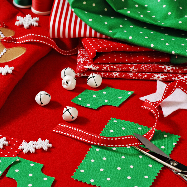 Christmas fabric set out for crafting