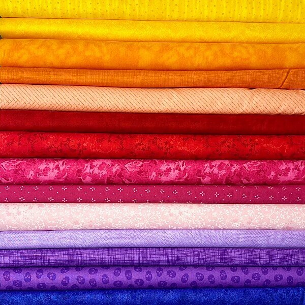 stack of colourful fabrics