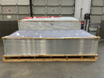 Two crated CMD2 double dome skylight pallets stacked together in the warehouse