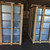 Two wood-crated stacks of Curbs Plus CPC-3 roof curbs in a warehouse
