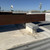 AES-3 equipment rail flashed into a single-ply roof