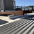 AES-3 equipment rail next to roof walkway pads