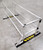 Assembled Kattsafe aluminum ladder protector guardrail with yellow and black safety base plates