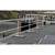 KattGuard GR34 guardrail on an urban rooftop lined with solar panels and city rowhouses