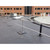 KattGuard guardrail on a rooftop near HVAC equipment and a brick office building