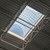View from inside the building looking up through the wire guard grid at the skylight dome