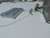 Technician wiring a Sunoptics SVT2 smoke vent during rooftop installation on a white membrane roof