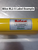 Close-up of the Bilco serial number label on the yellow guardrail tubing, a label example graphic