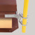 Detail shot of the yellow guardrail base bracket clamped to the red roof hatch curb