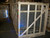 Wooden crate of stacked Velux safety cage screens in a warehouse