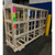 Crated safety screens with fragile and high-claim shipping labels in a warehouse