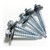 Close-up of hex-head self-drilling roof screws with rubber washers, used as Velux skylight fasteners