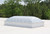 Velux double dome skylight installed on a white membrane roof, trees in the background