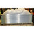 Large Velux CMD2 4872 skylight unit wrapped in plastic on a warehouse pallet, with a forklift visible behind it