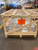 Wood-crated Velux shrink-out smoke vent staged in a warehouse for shipment