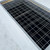 Curbs Plus Z-frame safety screen installed over a roof curb opening on a white membrane roof