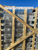 Stacked crated roof curb panels with a handwritten shipping label reading '10 Boxes inside'
