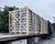 Wood-crated Curbs Plus roof curb loaded on a flatbed truck trailer for delivery