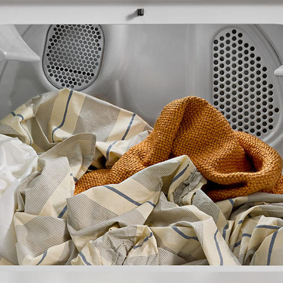 Whirlpool® 7.0 cu. ft. Gas Dryer with Adaptive Dry - Vented Top Load Matching WGD4105SW