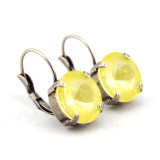 Soft Yellow Ignite 12mm Crystal Earrings in an Antique Silver setting
