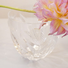 Crafted in France for Teleflora, this vintage bowl showcases a delicate tulip relief design.