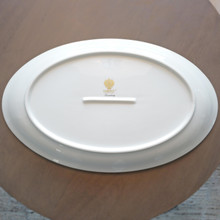 An heirloom-worthy investment, this Fabergé serving platter is a masterpiece of fine china. Whether displayed or used for special occasions, it embodies timeless luxury and the unmatched quality of Limoges craftsmanship.