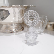 Vintage art deco EAPG perfume bottle with a textural geometric design.