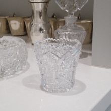 Collectible toothpick holder made of clear glass in the Daisy and Button pattern by Imperial Glass.