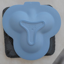 The back of a Wedgwood Jasperware ring dish.  This would fit perfectly on a bedside table as a jewelry dish, trinket dish, ring dish, or other catchall.