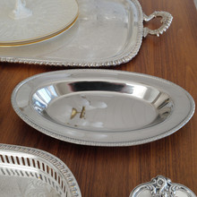 This vintage stainless steel tray features a delicate embossed rim that adds a hint of sophistication. Made by MSG in Japan, it’s a versatile and durable piece, ideal for both everyday use and special occasions.