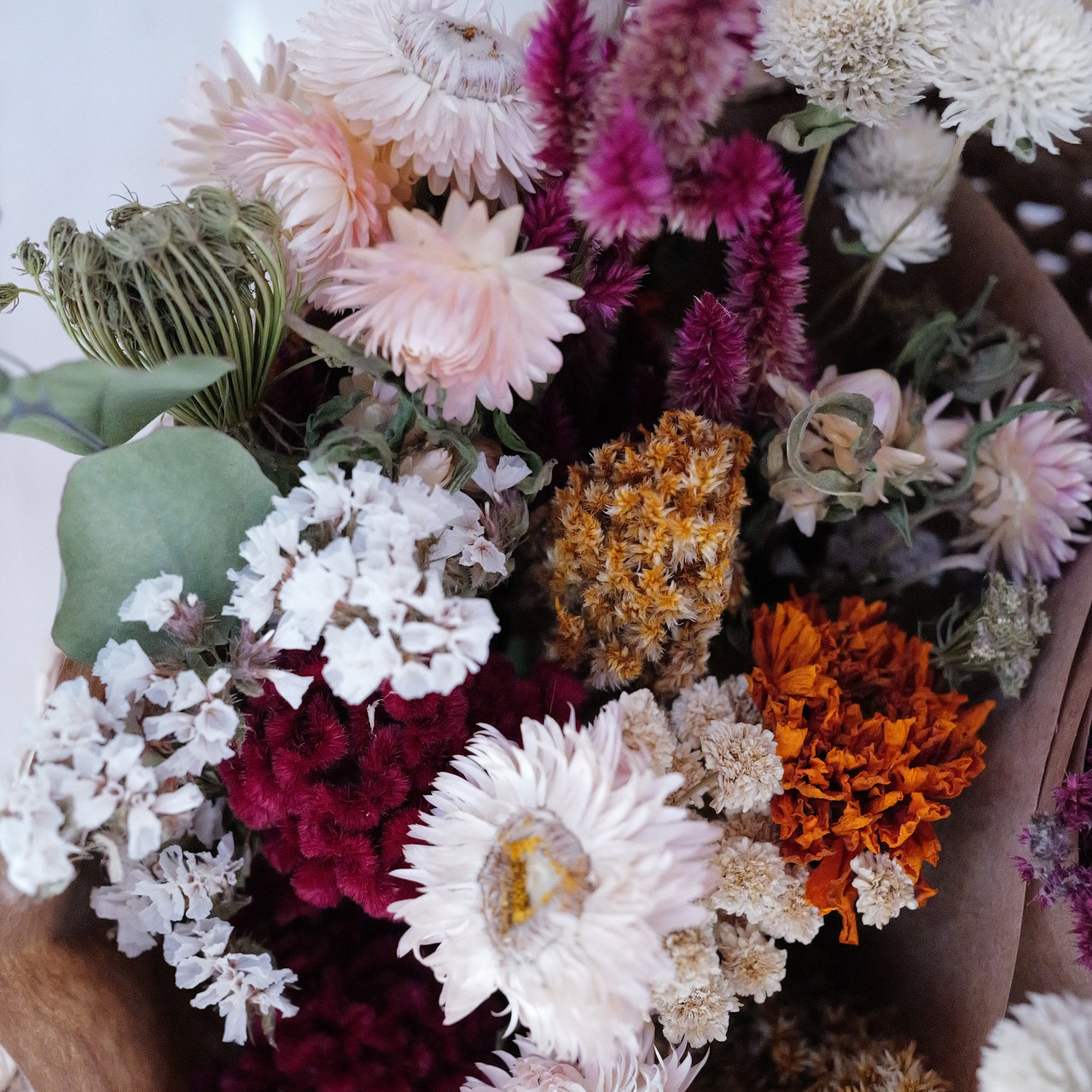All natural, sustainably grown and dried flowers from the Midwest.  USA made!  Grown without the use of pesticides, herbicides, or fungicides.  And dried with out dies.  This stunning forever flower bouquet is healthy, natural, and supports a Midwest farm.  The colors are a mix of saturated magenta pinks, subtle pink and purple hues, marigold orange, deep yellows, and natural whites.