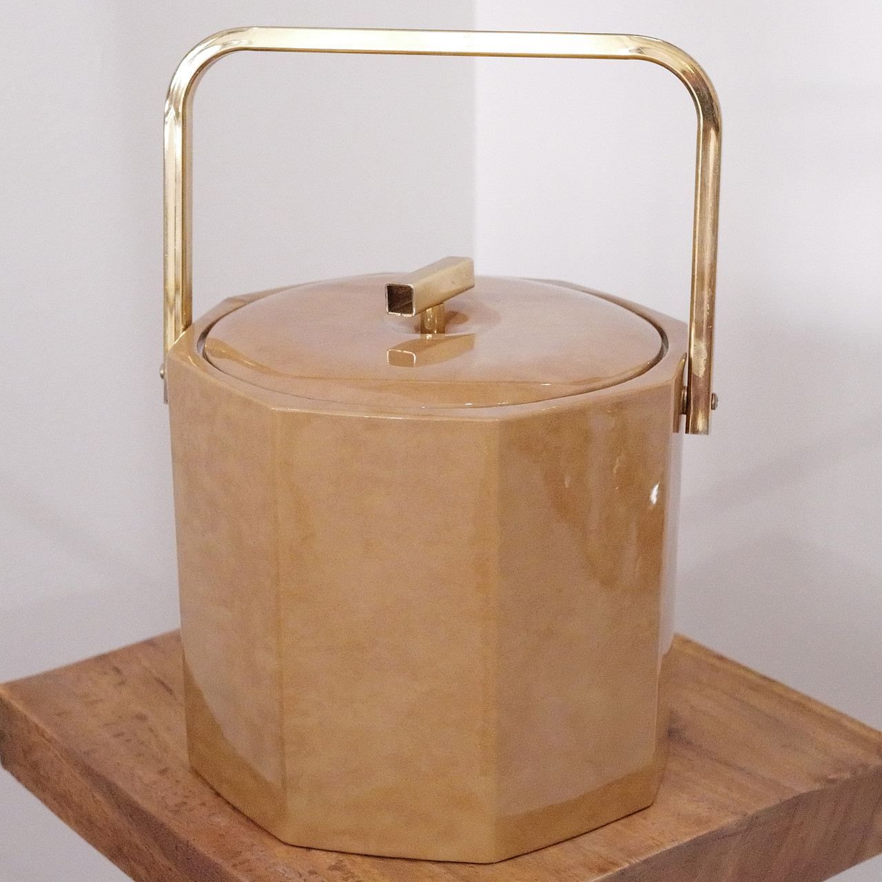 Vintage George Briard octagonal ice bucket in camel vinyl with brass handle.  Exceptional retro 1970s barware, or collectible 1970s entertaining gift.