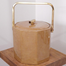 A rare George Briard octagonal ice bucket, wrapped in faux marble vinyl with a soft padded feel, perfect for retro entertaining.