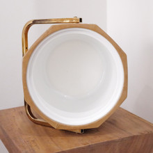 The interior white plastic liner is built in and easy to clean.