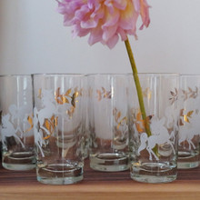 Rare vintage.  1950s Libbey unicorn highball glass with frosted white unicorns and shimmering gold leaves