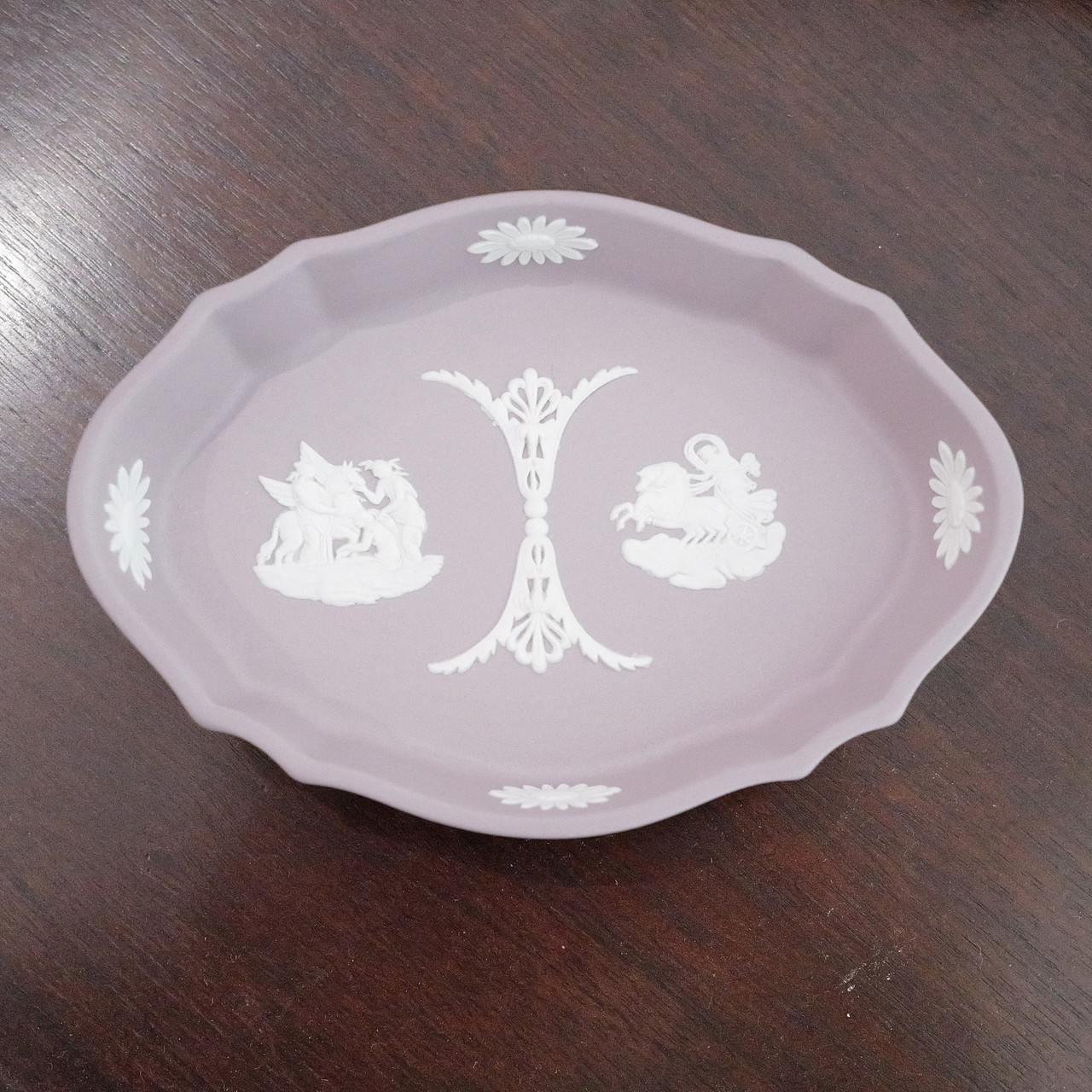 Rare vintage.  This cream on lilac Wedgwood jasperware dish features Aurora and the Muses watering Pegasus. The collectible oval scalloped tray, was Made in England and carries the Wedgwood backstamp.